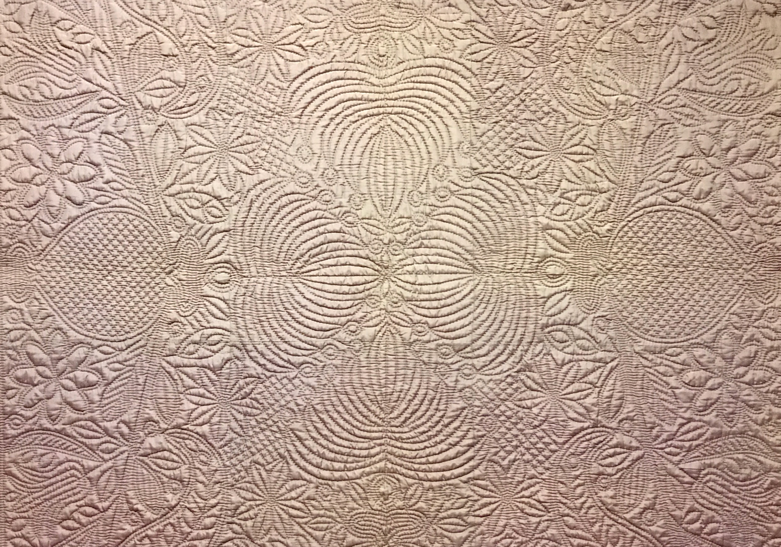 "Couvre-lit" from Provence detail of purple wholecloth quilt from Provence