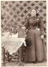 Posing with Patchwork: Quilts in Photographs, 1855-1945
