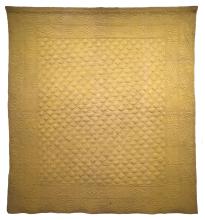 large golden "couvre-lit" or wholecloth quilt